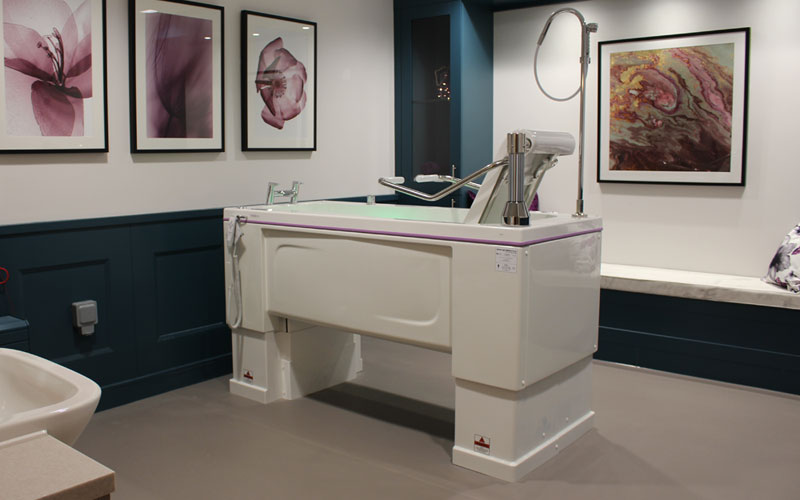 Gentona-bath-in-wet-room Bath with adjustable safe working height hi-lo functionality