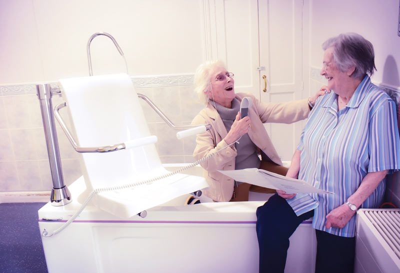 Women laughing in bathroom