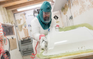 man manufacturing a bath