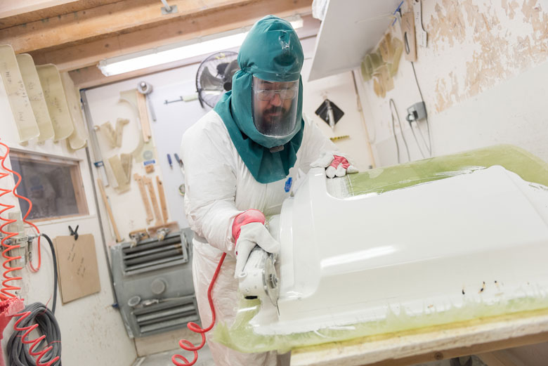 man manufacturing a bath